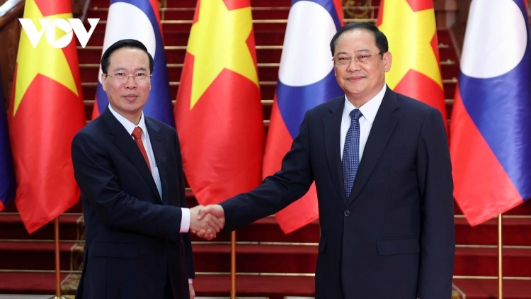 President Thuong meets Prime Minister, top legislator of Laos